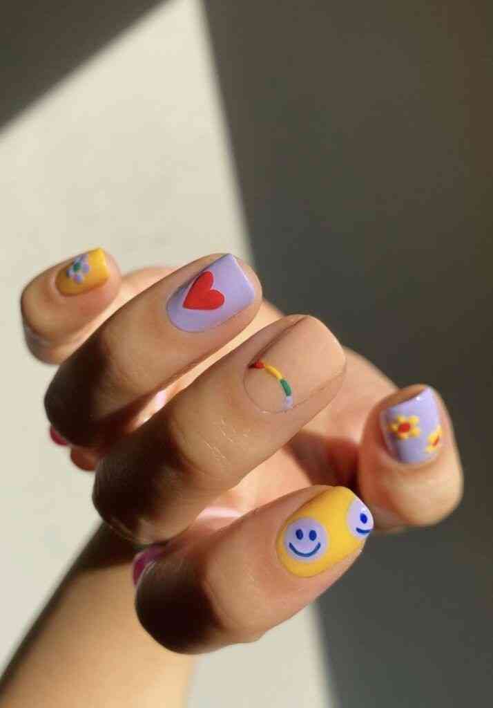 Smiley Faces and Doodles nails